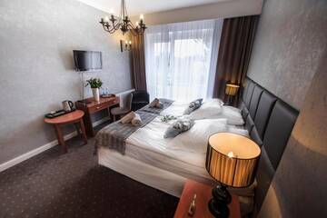 Фото номера Двухместный номер с 1 кроватью Курортные отели Rezydencja Pod Tężnią &amp; Spa г. Иновроцлав 8