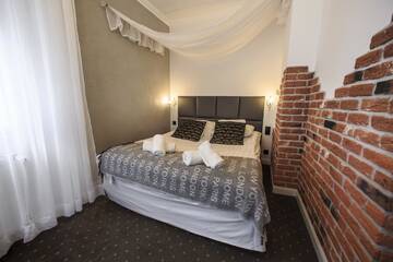 Фото номера Трехместный номер Курортные отели Rezydencja Pod Tężnią &amp; Spa г. Иновроцлав 3