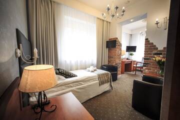 Фото номера Трехместный номер Курортные отели Rezydencja Pod Tężnią &amp; Spa г. Иновроцлав 4