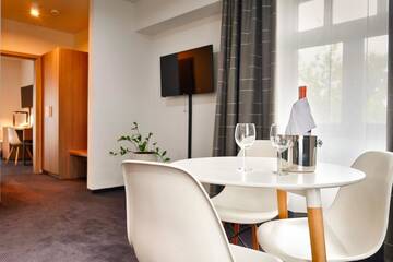 Фото номера Апартаменты Отель Focus Hotel Premium Inowrocław г. Иновроцлав 3